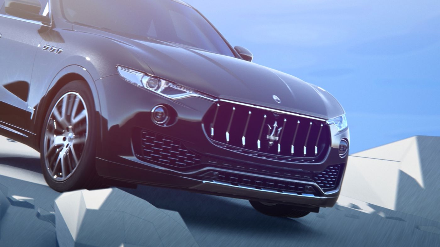 Vehículo Maserati sobre calle irregular con control de descenso de pendientes (HDC)