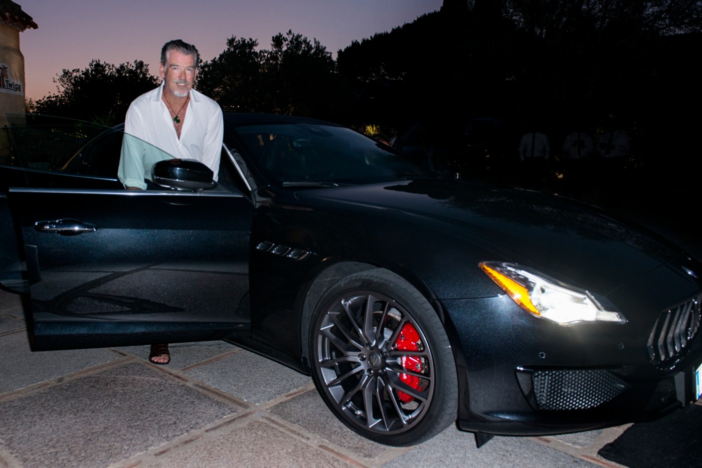 Actors-Pierce-Brosnan-arrives-at-Costa-Smeralda-Invitational-Gala-Dinner-in-a-Maserati-Quattroporte