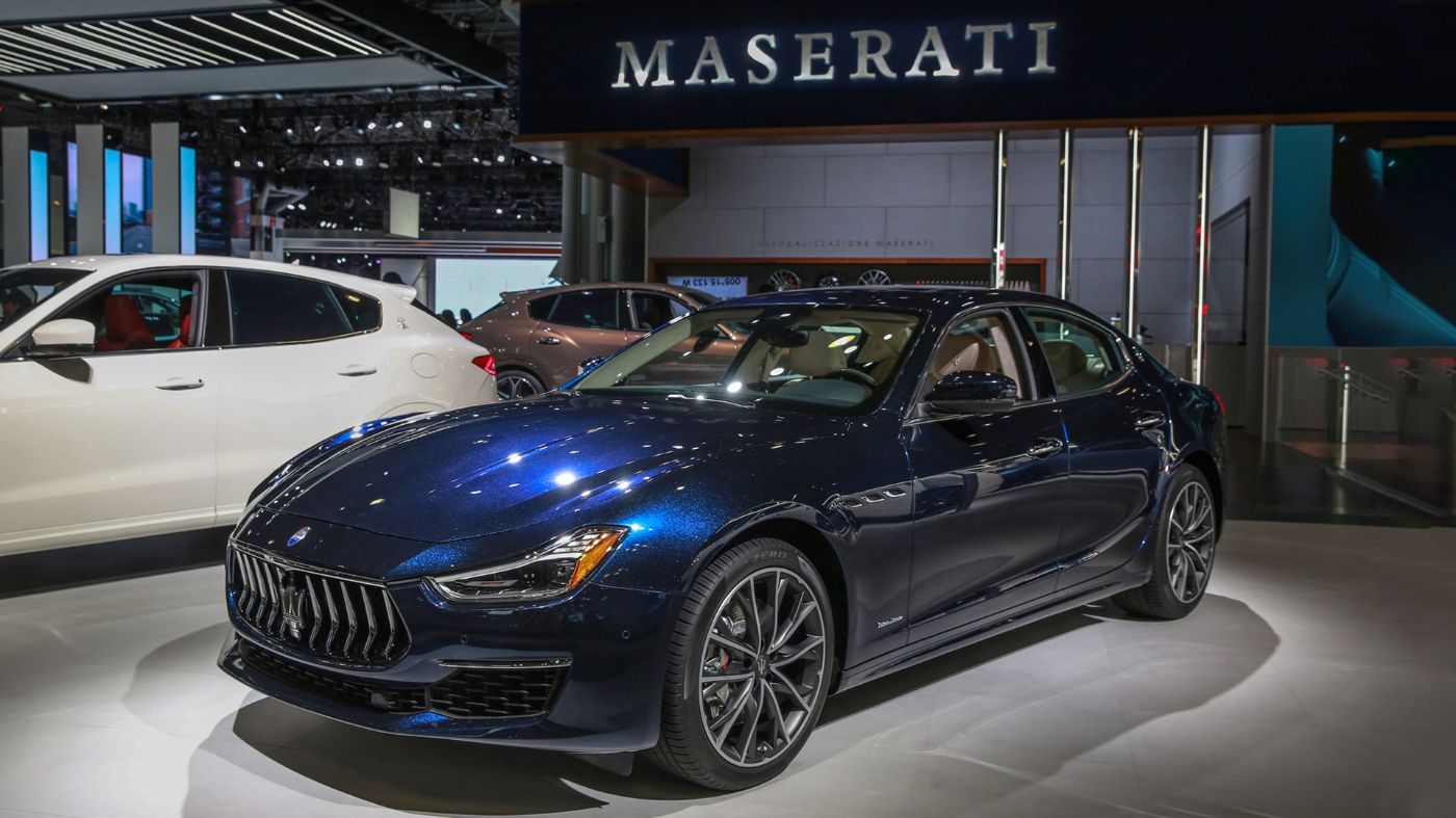 Blue Maserati model in showroom
